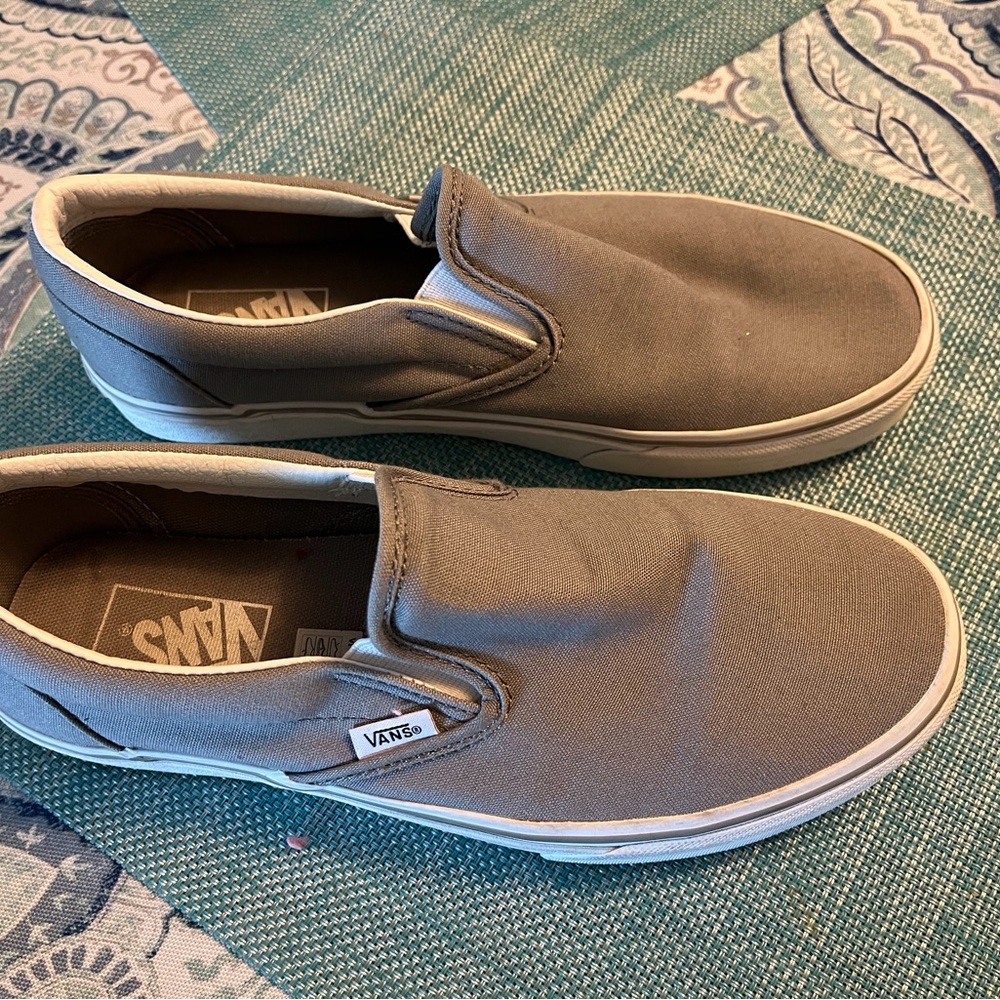 Gray Vans slip-on sneakers, women’s size 9.5, men’s size 8.